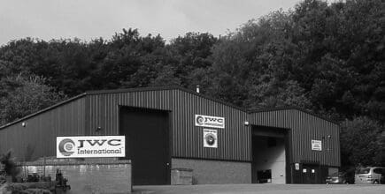 Black and white photo of JWC International operations warehouse