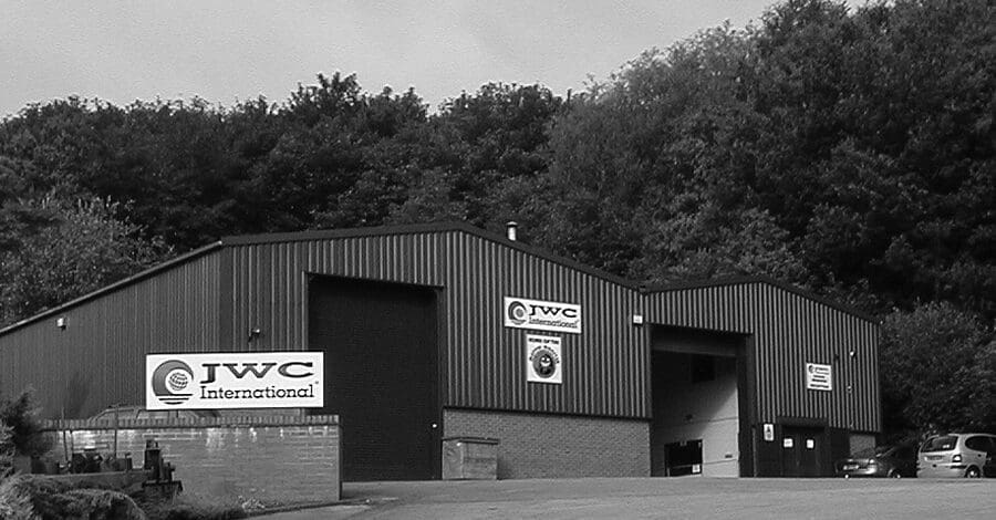 Black and white photo of JWC International operations warehouse