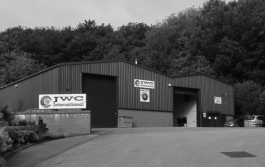 Black and white photo of JWC International operations warehouse