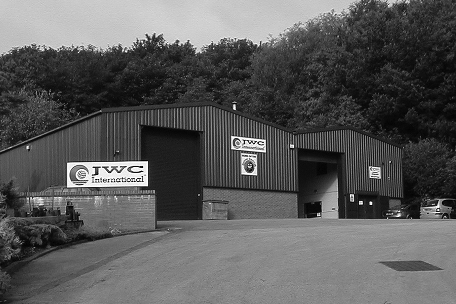 Black and white photo of JWC International operations warehouse