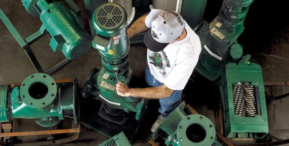 Man servicing Muffin Monster equipment