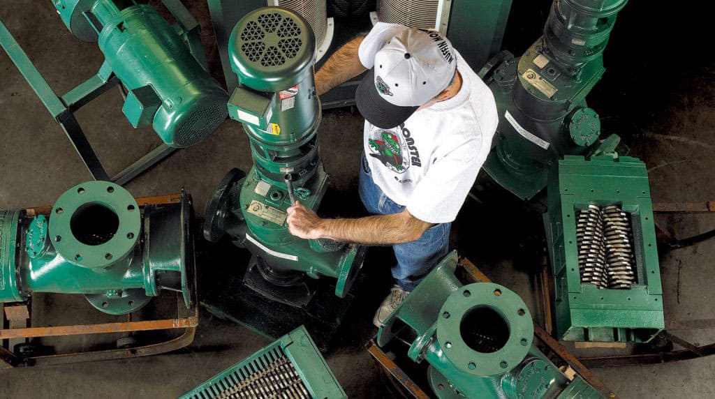 Man servicing Muffin Monster equipment